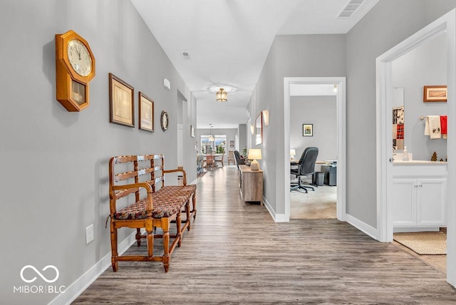 9470 Tobin Cir, Avon, IN 46123 - corridor featuring wood finished floors and an office area