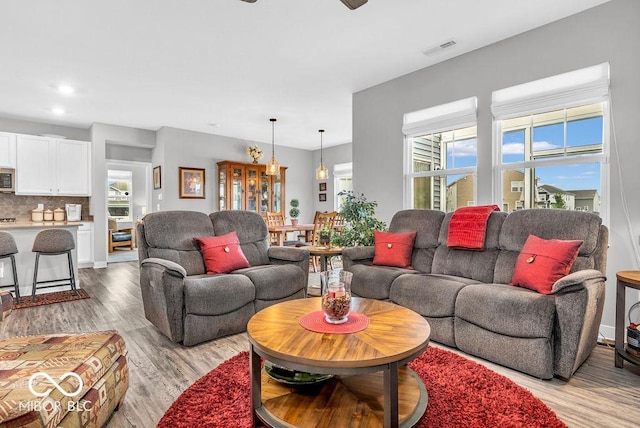 9470 Tobin Cir, Avon, IN 46123 - living room featuring light wood-style flooring, recessed lighting, and a ceiling fan