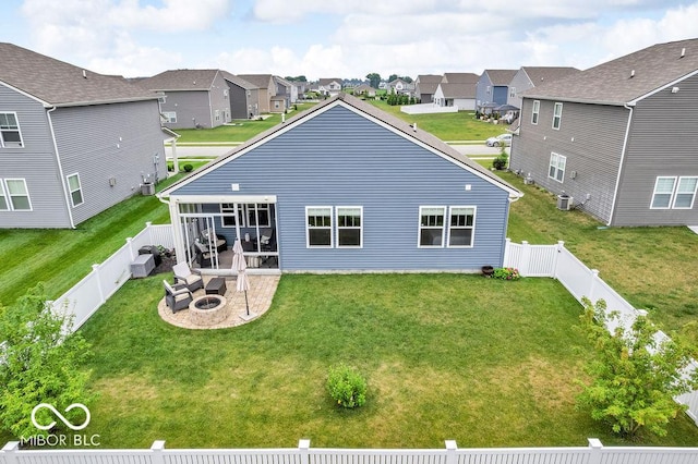 9470 Tobin Cir, Avon, IN 46123 - rear view of house featuring a fire pit, a residential view, a fenced backyard, and a patio area