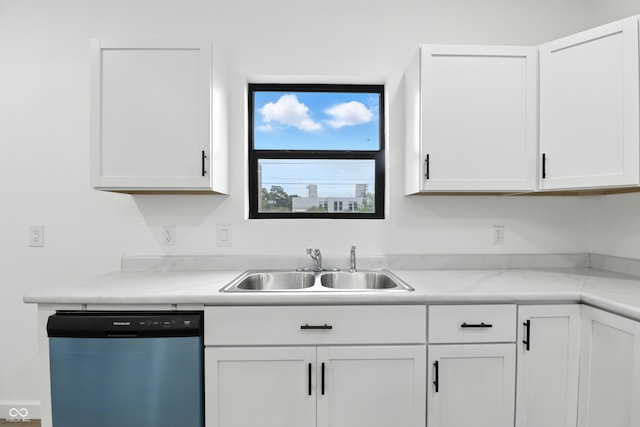 3455 N Illinois St, Indianapolis, IN 46208 - kitchen with dishwashing machine, white cabinets, and light countertops
