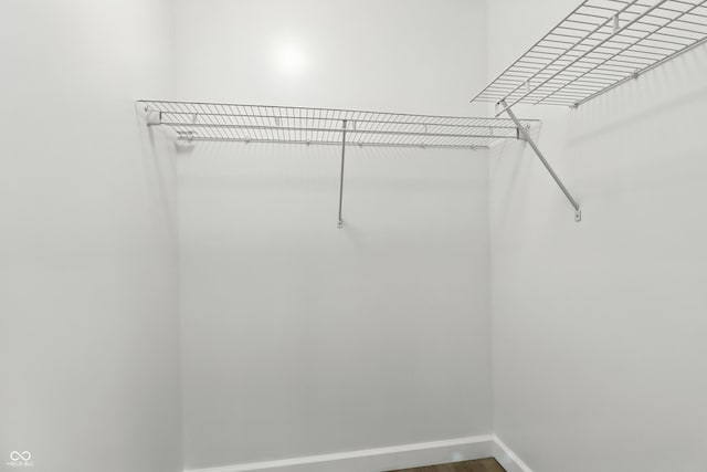3455 N Illinois St, Indianapolis, IN 46208 - walk in closet with light wood-style floors