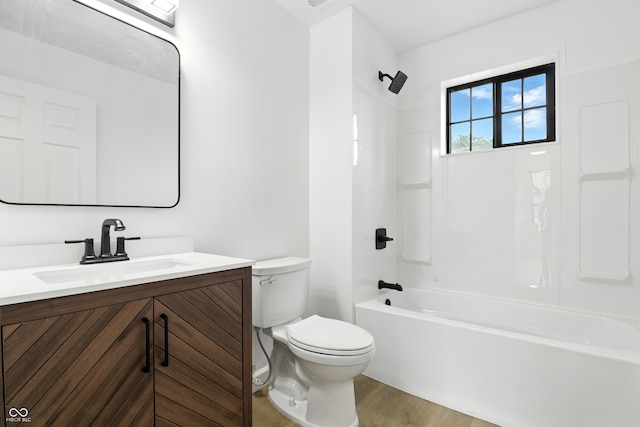 3455 N Illinois St, Indianapolis, IN 46208 - full bathroom with vanity, washtub / shower combination, and wood finished floors