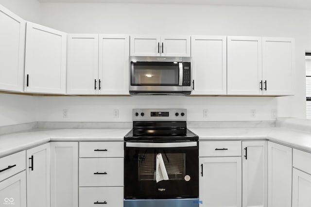 3455 N Illinois St, Indianapolis, IN 46208 - kitchen featuring appliances with stainless steel finishes and white cabinetry