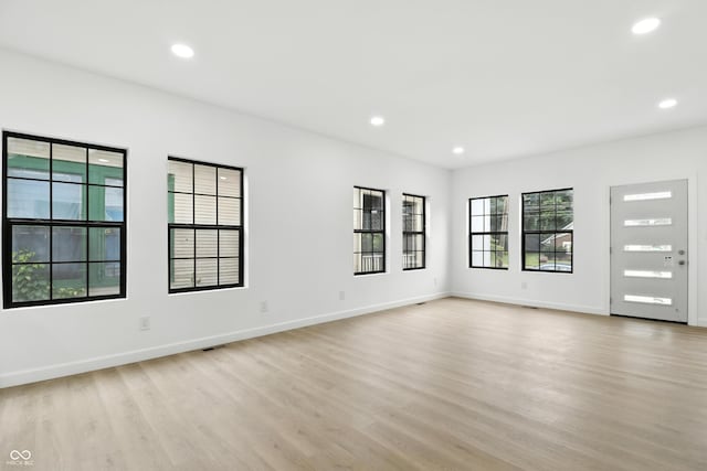 3455 N Illinois St, Indianapolis, IN 46208 - unfurnished room with light wood-style flooring and recessed lighting