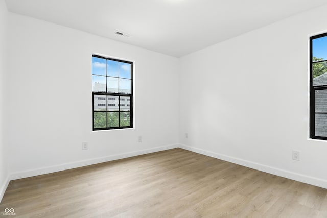 3455 N Illinois St, Indianapolis, IN 46208 - empty room featuring light wood-style flooring and baseboards