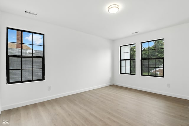 3455 N Illinois St, Indianapolis, IN 46208 - empty room with light wood-style flooring and baseboards