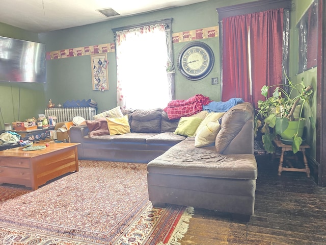 170 N County Road 1000 W, Greensburg, IN 47240 - living room featuring hardwood / wood-style flooring and radiator heating unit