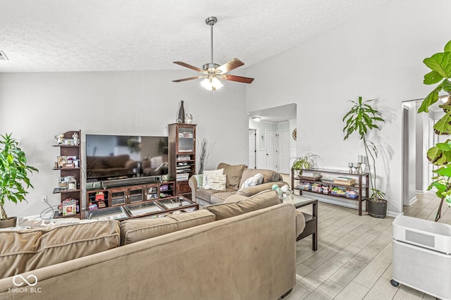 577 Austrian Way, Avon, IN 46123 - living area with a ceiling fan, a textured ceiling, and lofted ceiling