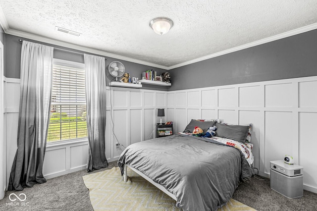577 Austrian Way, Avon, IN 46123 - carpeted bedroom featuring a decorative wall, a textured ceiling, and crown molding