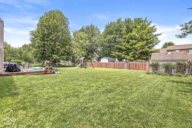 577 Austrian Way, Avon, IN 46123 - fenced backyard featuring a playground