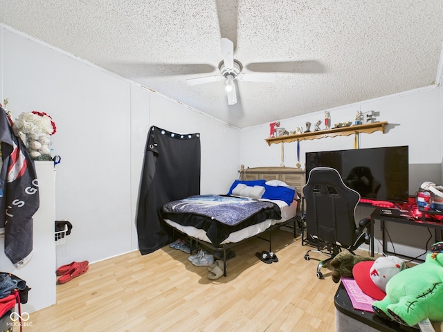 401 S Fletcher St, Frankton, IN 46044 - bedroom with a textured ceiling, wood finished floors, and ceiling fan