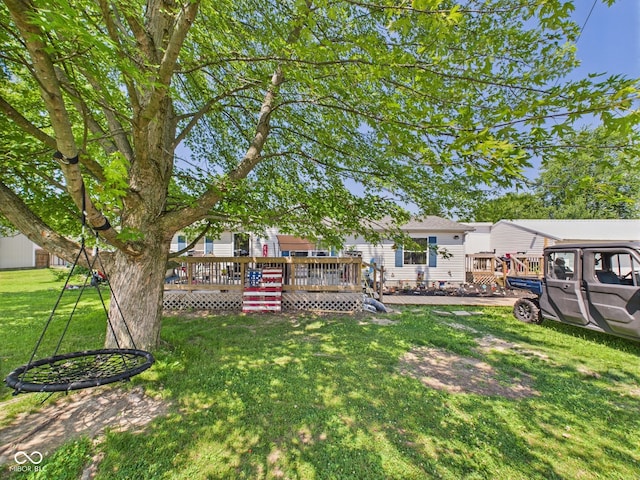 401 S Fletcher St, Frankton, IN 46044 - view of grassy yard with a wooden deck