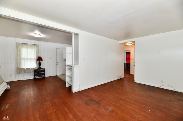 8921 E 21st St, Indianapolis, IN 46219 - unfurnished room featuring wood finished floors and baseboards
