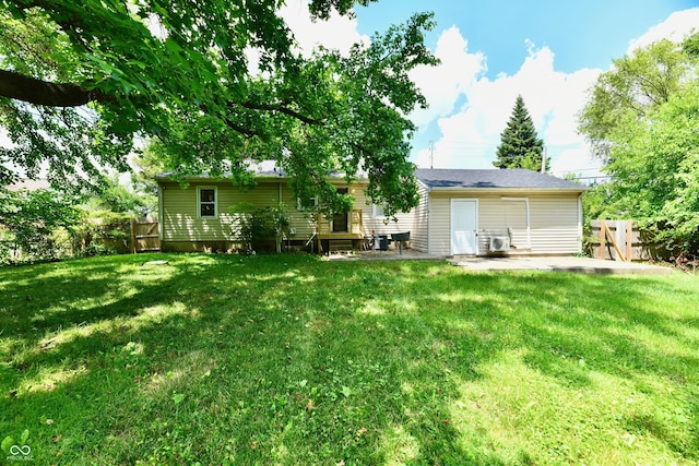 8921 E 21st St, Indianapolis, IN 46219 - back of house with a patio and a fenced backyard