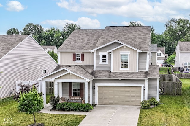 6819 Park Grove Blvd, Whitestown, IN 46075 - view of front of home with a porch, concrete driveway, a shingled roof, a garage, and board and batten siding