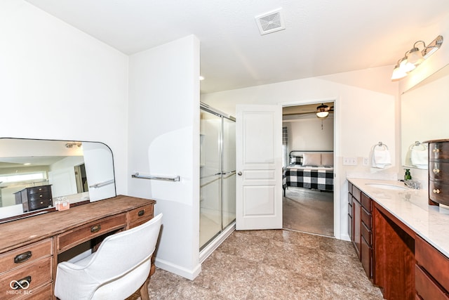 6819 Park Grove Blvd, Whitestown, IN 46075 - bathroom with vanity, connected bathroom, a stall shower, and ceiling fan