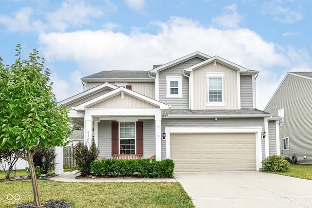 6819 Park Grove Blvd, Whitestown, IN 46075 - view of front of house with driveway, board and batten siding, a garage, and a front yard