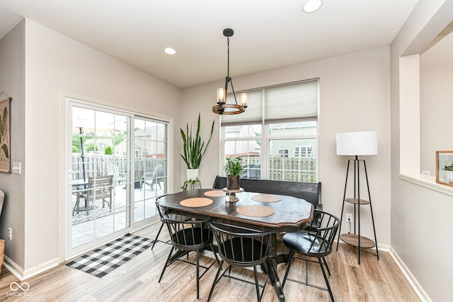 6819 Park Grove Blvd, Whitestown, IN 46075 - dining area with light wood finished floors, recessed lighting, and a chandelier