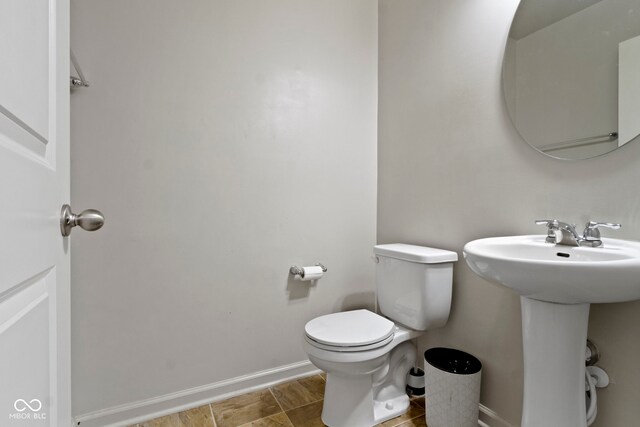 5776 Blue Sky Dr, Whitestown, IN 46075 - half bathroom with toilet and baseboards