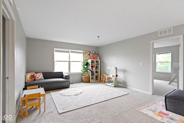 5776 Blue Sky Dr, Whitestown, IN 46075 - living room featuring carpet floors and baseboards
