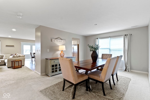 5776 Blue Sky Dr, Whitestown, IN 46075 - dining space with light colored carpet and recessed lighting