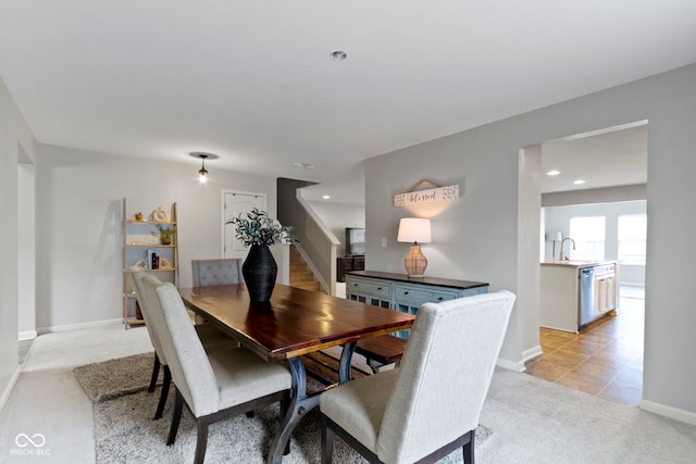 5776 Blue Sky Dr, Whitestown, IN 46075 - dining area with stairway, light colored carpet, and recessed lighting