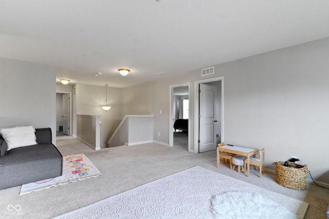 5776 Blue Sky Dr, Whitestown, IN 46075 - living area with light carpet and baseboards