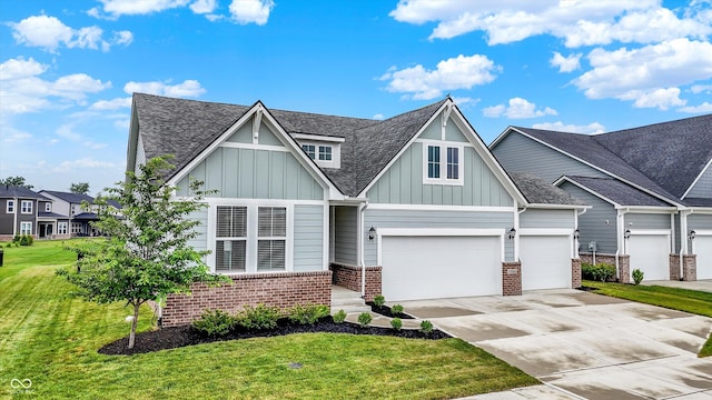 15744 Kohut Ln, Westfield, IN 46074 - view of front facade with brick siding, board and batten siding, a front lawn, and driveway