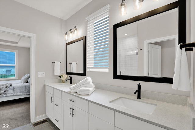 15744 Kohut Ln, Westfield, IN 46074 - ensuite bathroom featuring double vanity, plenty of natural light, and tiled shower