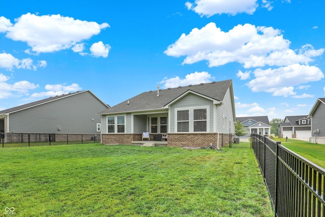 15744 Kohut Ln, Westfield, IN 46074 - rear view of property featuring brick siding and a fenced backyard