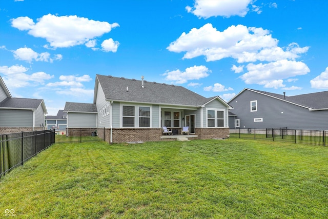 15744 Kohut Ln, Westfield, IN 46074 - rear view of property with brick siding, a fenced backyard, a patio, and a shingled roof