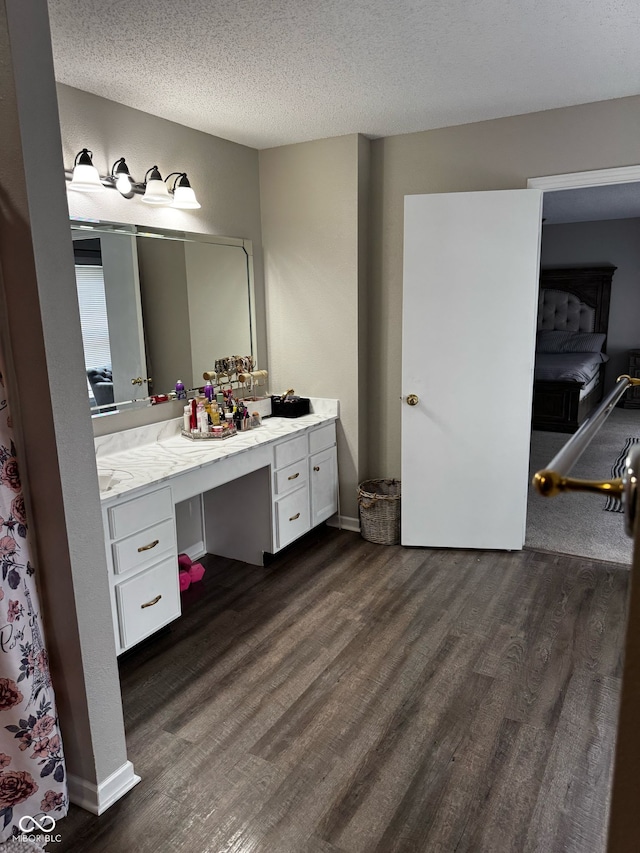 12583 Courage Xing, Fishers, IN 46037 - full bathroom with wood finished floors, vanity, and a textured ceiling