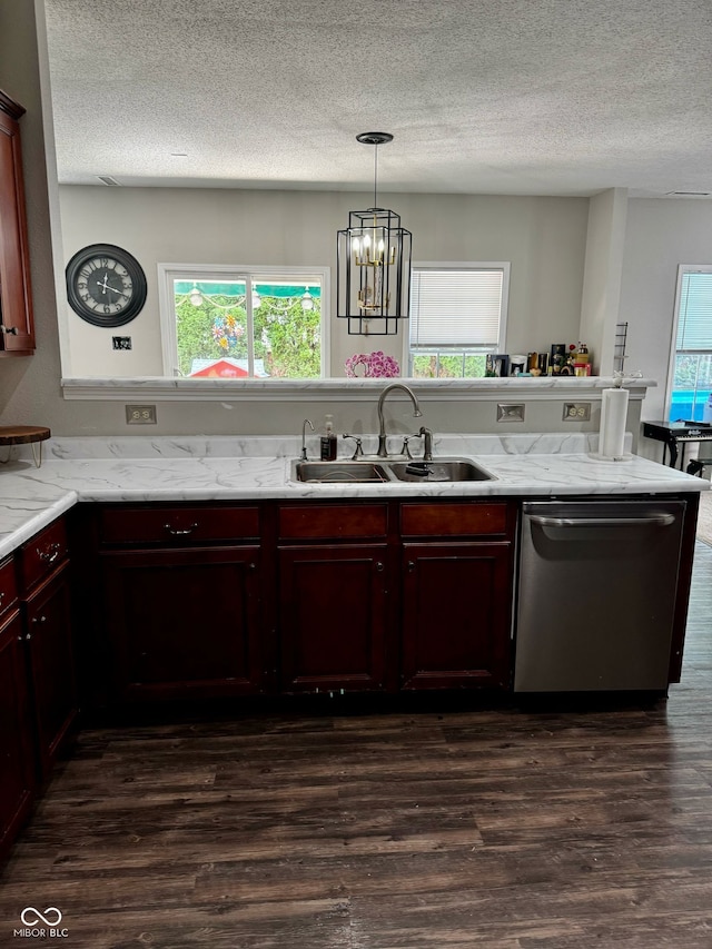 12583 Courage Xing, Fishers, IN 46037 - kitchen with a textured ceiling, dishwasher, dark wood finished floors, healthy amount of natural light, and dark brown cabinets