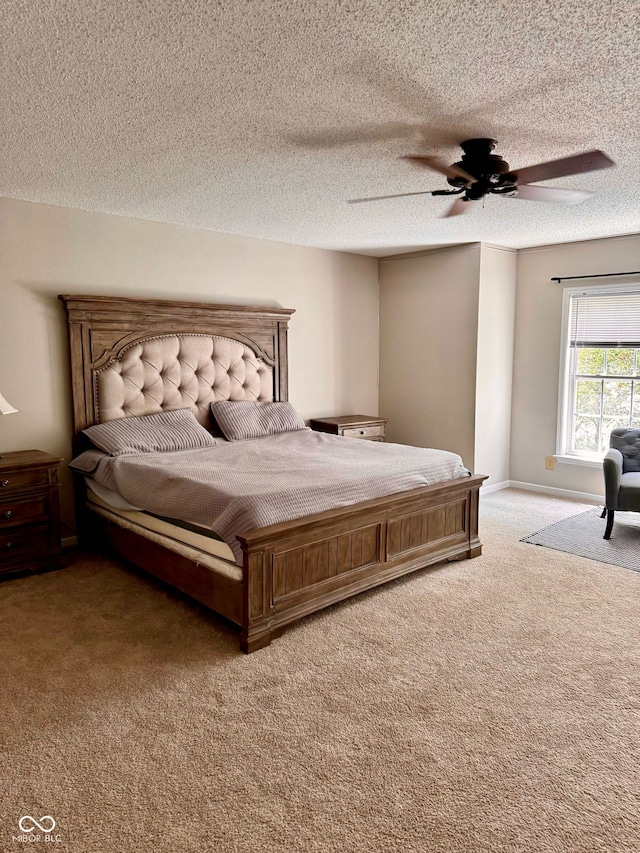 12583 Courage Xing, Fishers, IN 46037 - bedroom featuring carpet, a ceiling fan, and a textured ceiling