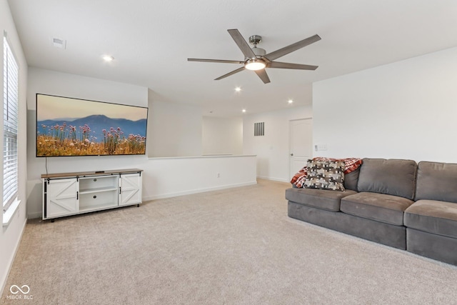 1022 Cyprian Way, Lebanon, IN 46052 - living area featuring a ceiling fan, carpet, and recessed lighting