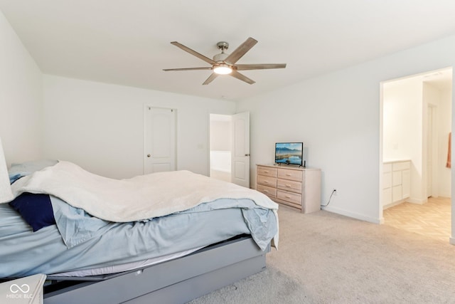 1022 Cyprian Way, Lebanon, IN 46052 - bedroom featuring light carpet, ceiling fan, and ensuite bath