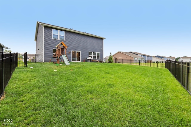 1022 Cyprian Way, Lebanon, IN 46052 - back of property featuring a fenced backyard and a playground