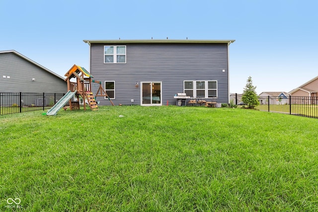 1022 Cyprian Way, Lebanon, IN 46052 - back of house featuring a playground and a fenced backyard