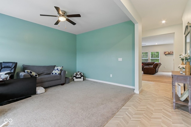 1022 Cyprian Way, Lebanon, IN 46052 - living room featuring a ceiling fan, light carpet, and recessed lighting