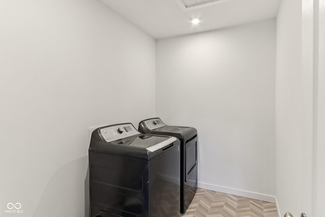 1022 Cyprian Way, Lebanon, IN 46052 - laundry room featuring washer and clothes dryer and baseboards