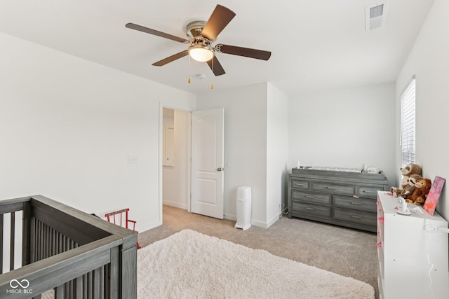 1022 Cyprian Way, Lebanon, IN 46052 - bedroom with carpet flooring, a ceiling fan, and a nursery area