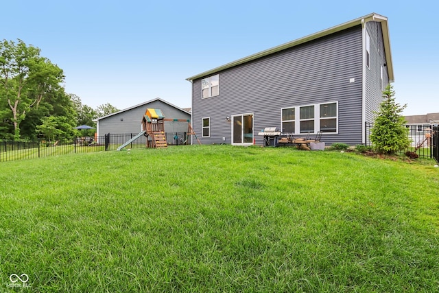 1022 Cyprian Way, Lebanon, IN 46052 - rear view of property featuring a playground and a fenced backyard