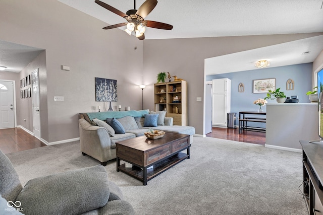 7702 Wood Stream Dr, Indianapolis, IN 46239 - living room featuring carpet, a ceiling fan, high vaulted ceiling, and a textured ceiling