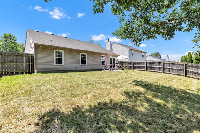 7702 Wood Stream Dr, Indianapolis, IN 46239 - rear view of house featuring a fenced backyard