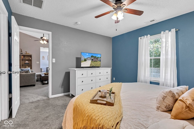 7702 Wood Stream Dr, Indianapolis, IN 46239 - carpeted bedroom with a textured ceiling and ceiling fan