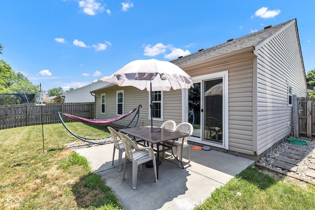 7702 Wood Stream Dr, Indianapolis, IN 46239 - fenced backyard featuring a patio and outdoor dining area