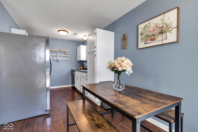 7702 Wood Stream Dr, Indianapolis, IN 46239 - dining space with dark wood-style floors and baseboards