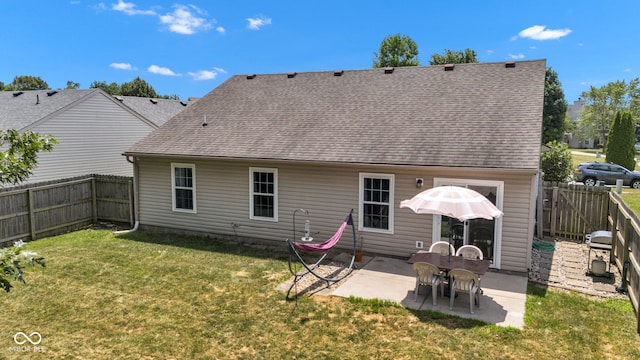 7702 Wood Stream Dr, Indianapolis, IN 46239 - back of property with a patio area, roof with shingles, and a fenced backyard