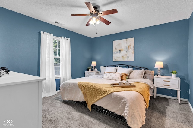 7702 Wood Stream Dr, Indianapolis, IN 46239 - carpeted bedroom featuring a textured ceiling and ceiling fan