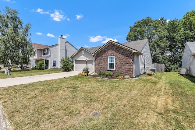 7702 Wood Stream Dr, Indianapolis, IN 46239 - view of front of home with brick siding, concrete driveway, and a garage